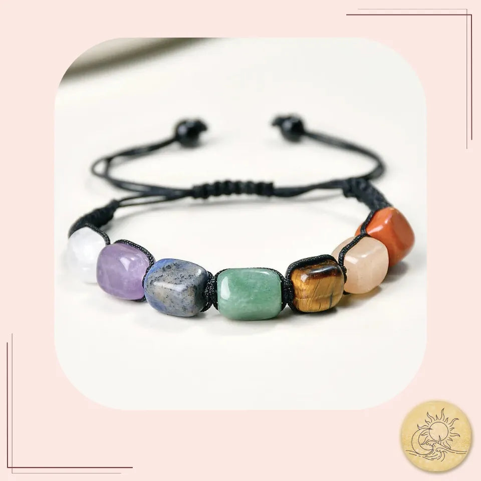 Bracelet 7 chakras en pierres naturelles, perles multicolores symbolisant l’harmonie des énergies, l’équilibre des émotions et le bien-être spirituel Aura Cristal.