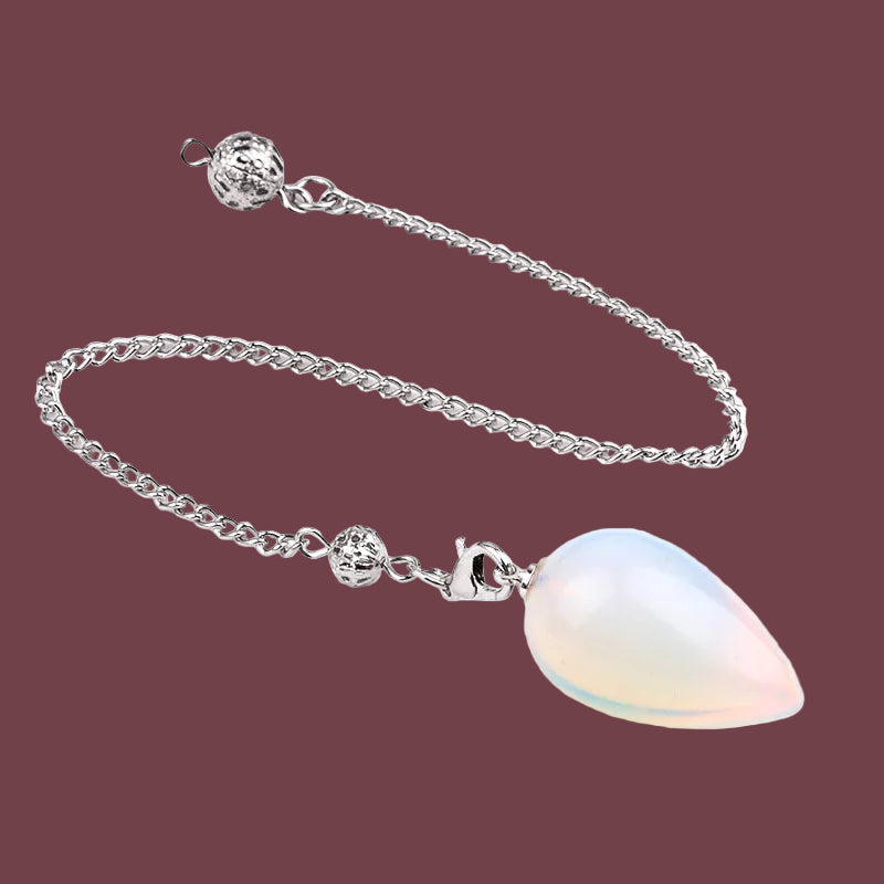 Pendule en opale synthétique en forme de goutte – pierre d’harmonie, d’intuition et de lumière intérieure – Aura Cristal